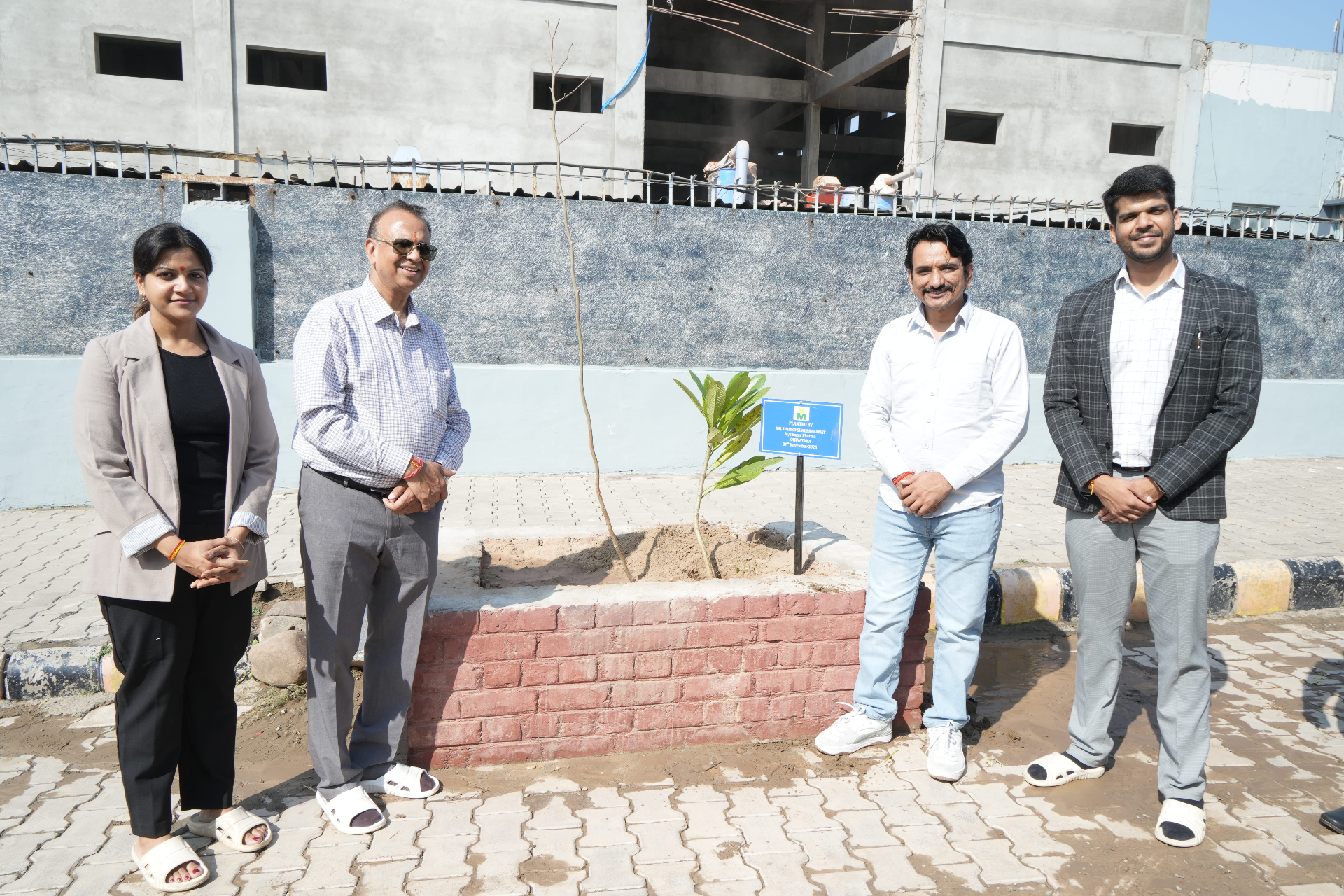 Arika leadership planting a sapling with partner from Karnataka