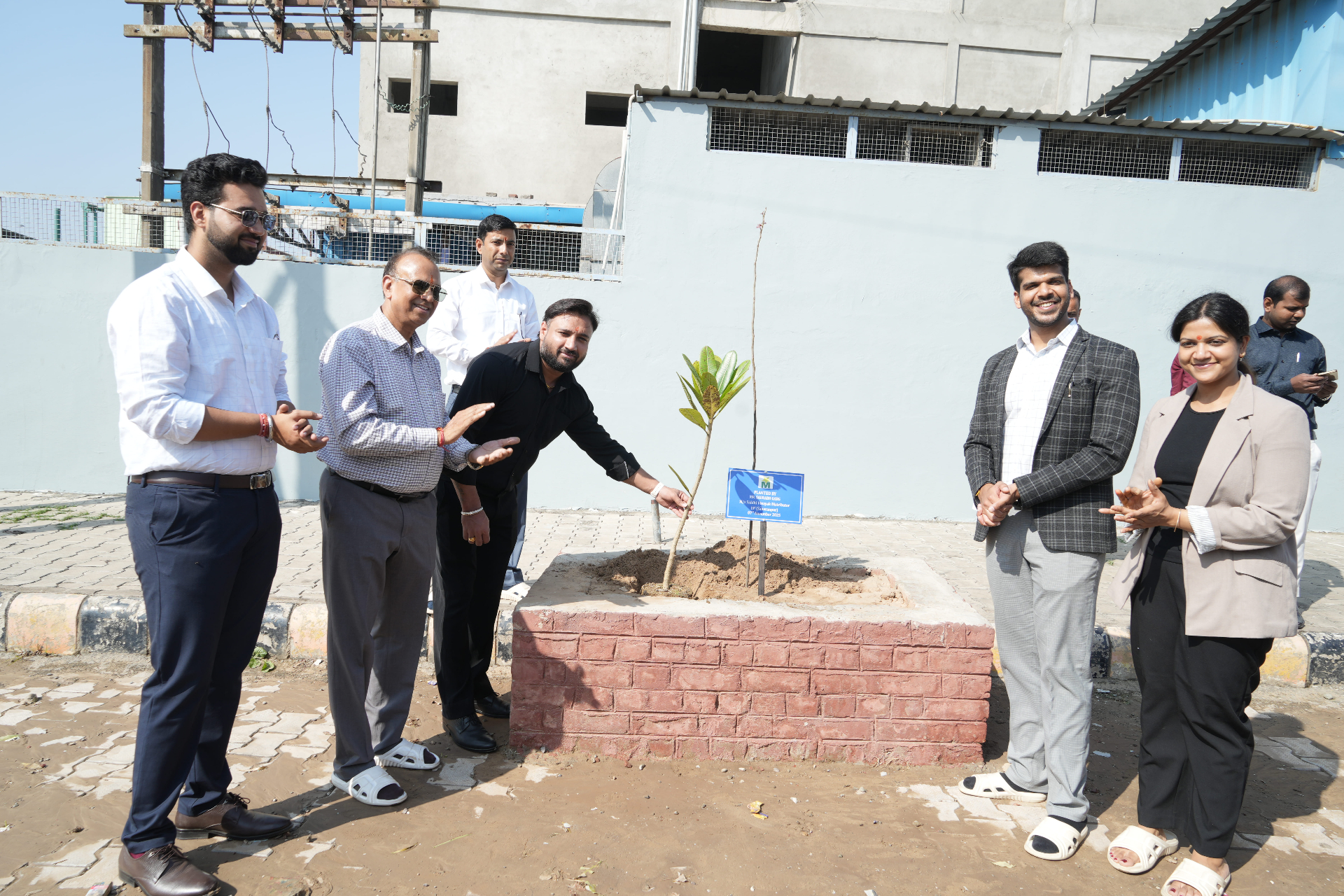 Tree planting ceremony with distributor partners