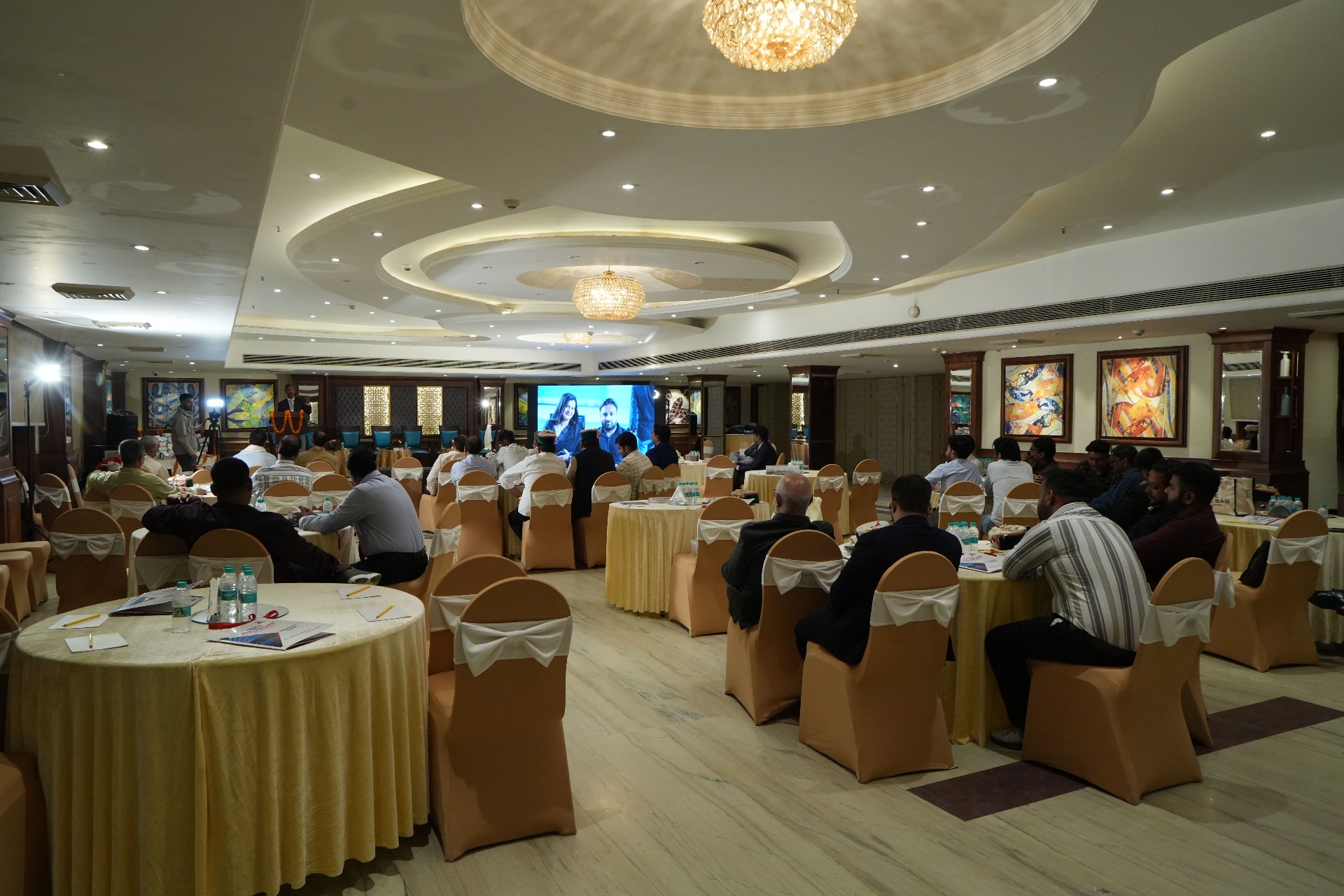 Wide view of the conference hall with seated attendees during the Arika partner meet
