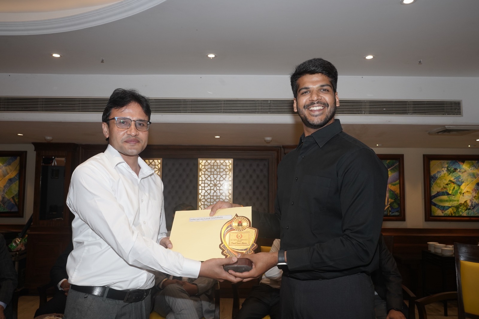 Years-of-service award presentation to Dinesh Kumar Sharma